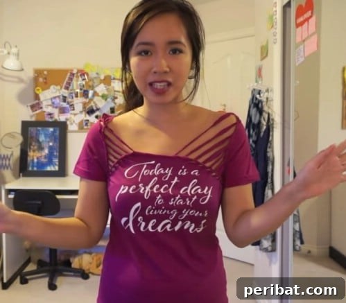 Cut out both sides of your T-shirt’s neckline.