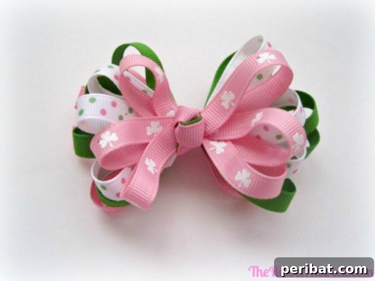 Dynamic Colorful Loopy Ribbon Bow made with multiple narrow ribbons looped together for a voluminous effect.