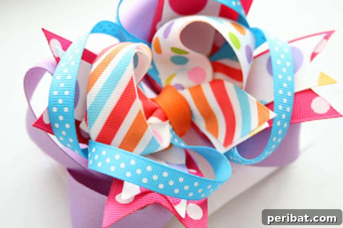 Vibrant Twisted Funky Hair Bow, made from multiple colorful ribbons twisted and layered for a playful, voluminous look.