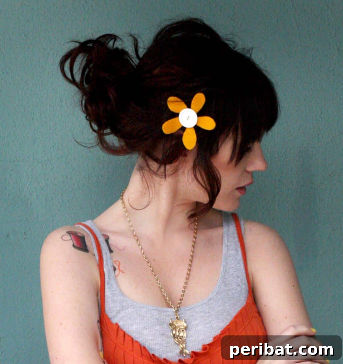 Stylish Flower Power Bow, cut from felt and adorned with a central button or gem, suitable for older girls and teens.
