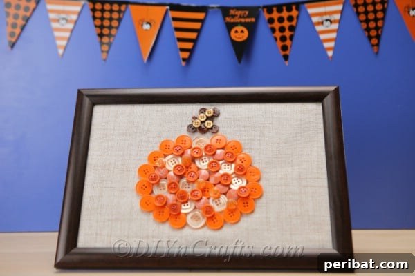 Pumpkin button art on a wall