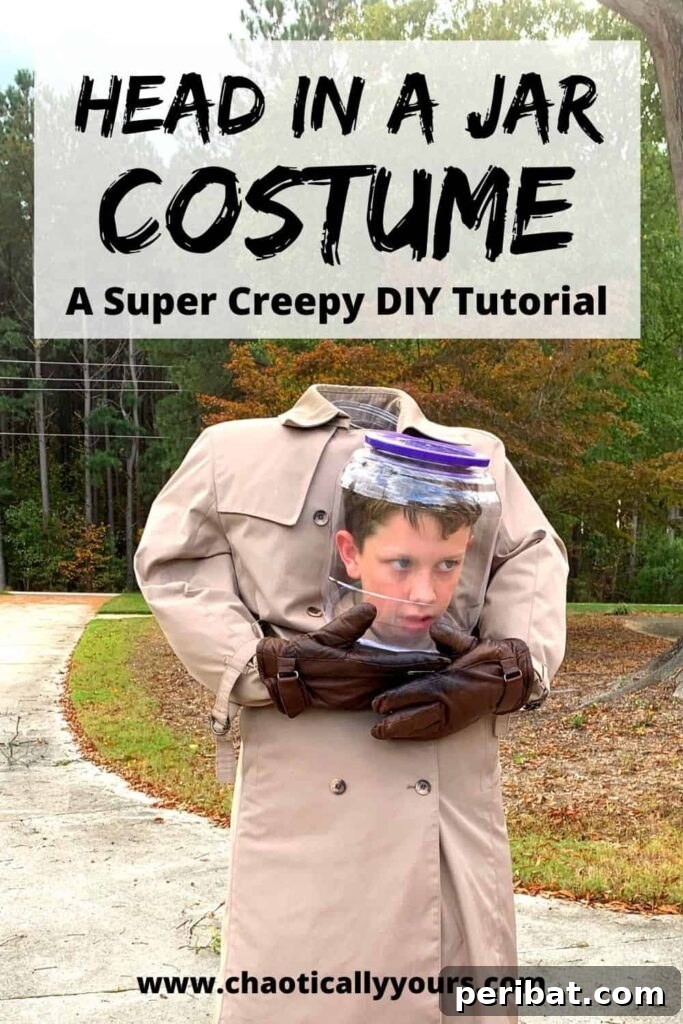 75 Effortless DIY Halloween Costumes That Kids Adore 15 A boy wearing a creative and creepy DIY head in a jar Halloween costume on a driveway