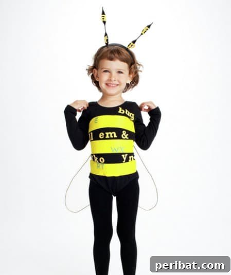 75 Effortless DIY Halloween Costumes That Kids Adore 18 An adorable child in a 'Spelling Bee' costume, featuring a bee outfit with attached words, perfect for unique Halloween fun