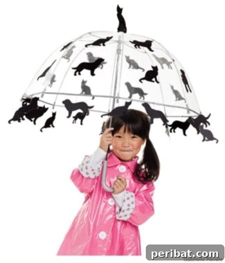 75 Effortless DIY Halloween Costumes That Kids Adore 32 A child in a whimsical 'Raining Cats and Dogs' costume, featuring a clear umbrella with attached animal cutouts, a clever DIY idea