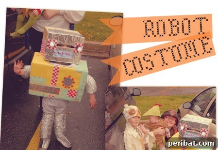 75 Effortless DIY Halloween Costumes That Kids Adore 35 A child dressed as 'Mr. Robot' for Halloween, a classic DIY costume made from cardboard boxes and silver tubing