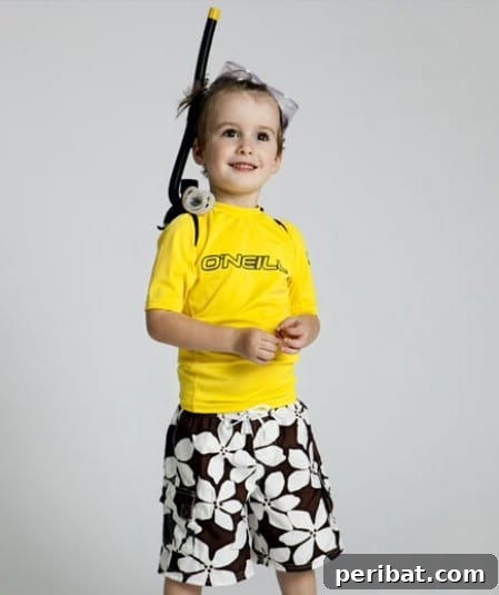 75 Effortless DIY Halloween Costumes That Kids Adore 42 A child dressed as a 'Scuba Diver' for Halloween, complete with snorkeling gear and oxygen tanks made from soda bottles