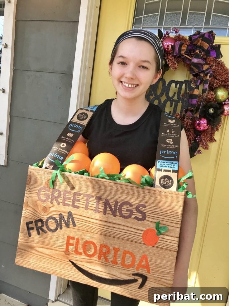 75 Effortless DIY Halloween Costumes That Kids Adore 6 A girl proudly displaying a fun DIY Florida oranges Halloween costume, a unique and sweet idea