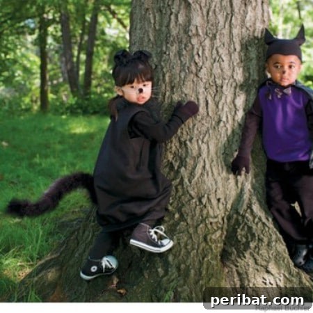 75 Effortless DIY Halloween Costumes That Kids Adore 76 A child in a cool 'Cat' costume for Halloween, featuring a black oversized sweatshirt, socks for paws, whiskers, and a boa tail, an easy DIY idea