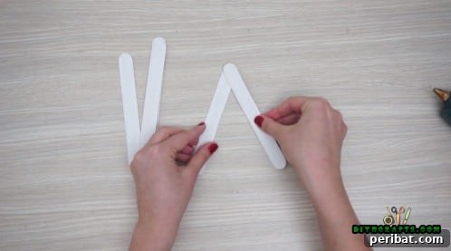 Effortless Holiday Crafting 5 DIY Ornament Videos 14 Partially assembled craft stick star