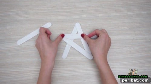 Effortless Holiday Crafting 5 DIY Ornament Videos 18 Fully assembled craft stick star