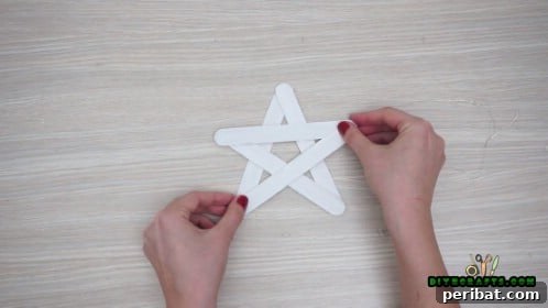 Effortless Holiday Crafting 5 DIY Ornament Videos 19 Another angle of the star with all sticks glued