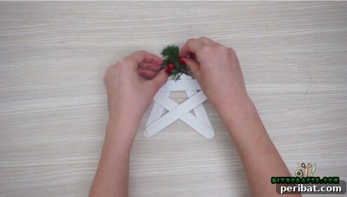 Effortless Holiday Crafting 5 DIY Ornament Videos 20 Embellish the craft stick star with glitter and gems