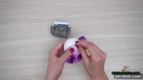 Effortless Holiday Crafting 5 DIY Ornament Videos 24 Start attaching fake flower petals to a Styrofoam ball