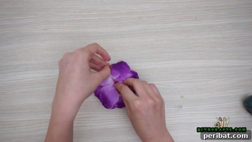 Effortless Holiday Crafting 5 DIY Ornament Videos 27 Add cord or twine to hang the flower petal ornament