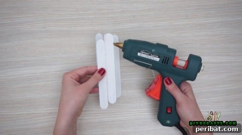 Effortless Holiday Crafting 5 DIY Ornament Videos 5 Glue three craft sticks side by side