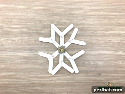 Effortless Holiday Crafting 5 DIY Ornament Videos 37 Finished craft stick snowflake ornament