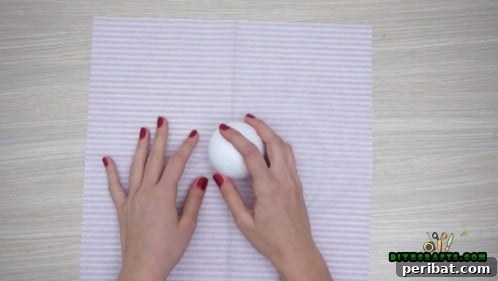 Effortless Holiday Crafting 5 DIY Ornament Videos 40 Wrap a craft ball in festive tissue paper