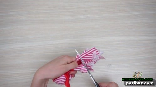 Effortless Holiday Crafting 5 DIY Ornament Videos 43 Cut off excess tissue paper above the ribbon