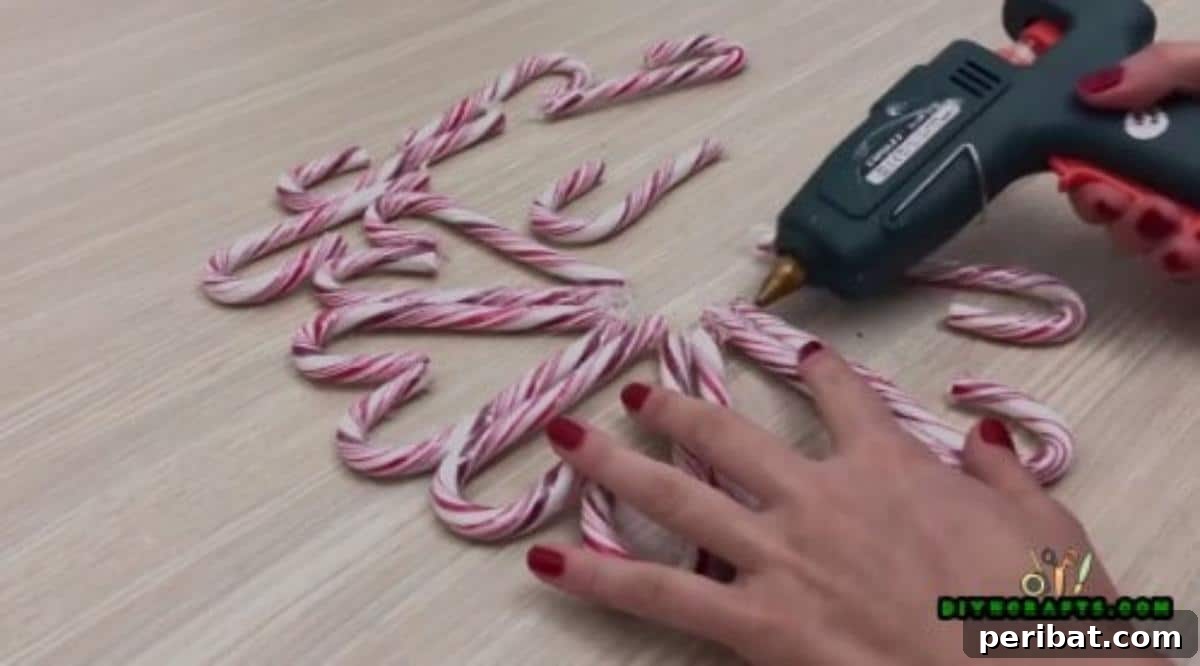 5 Festive Candy Cane Crafts to Sweeten Your Christmas 28 Candy Cane Wreath - 5 Candy Cane Projects for a Deliciously Festive Christmas