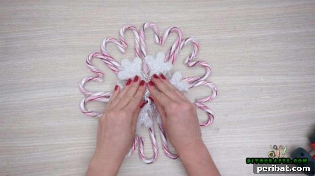 5 Festive Candy Cane Crafts to Sweeten Your Christmas 29 Candy Cane Wreath - 5 Candy Cane Projects for a Deliciously Festive Christmas