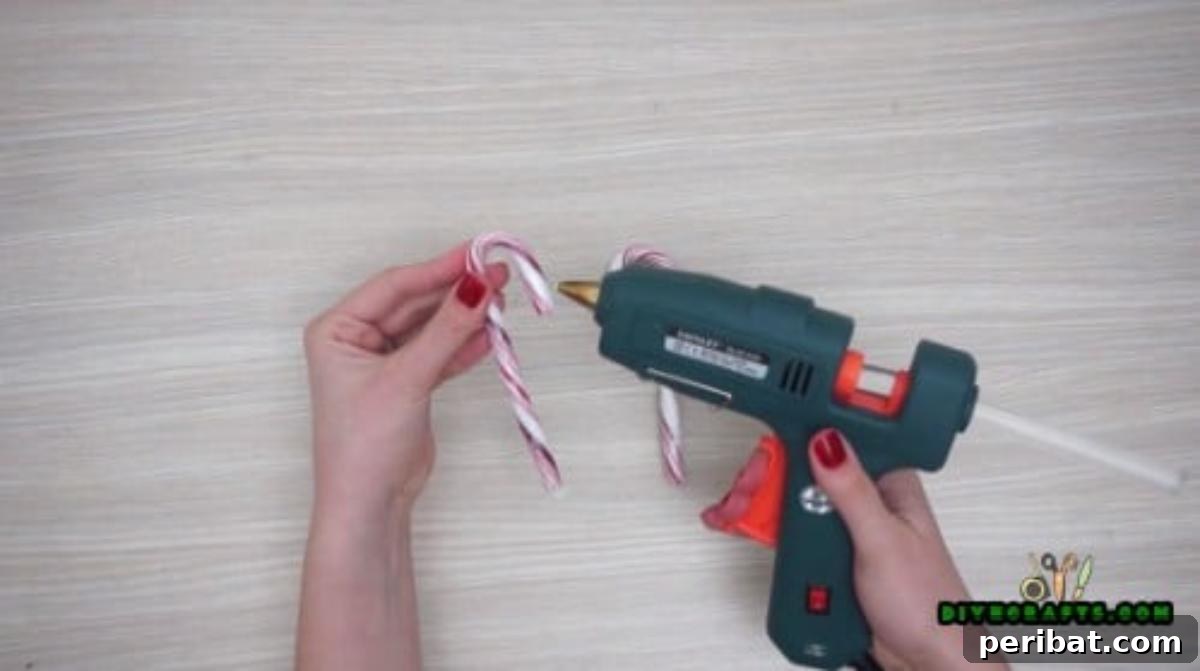 5 Festive Candy Cane Crafts to Sweeten Your Christmas 8 Candy Cane Heart Ornament - 5 Candy Cane Projects for a Deliciously Festive Christmas
