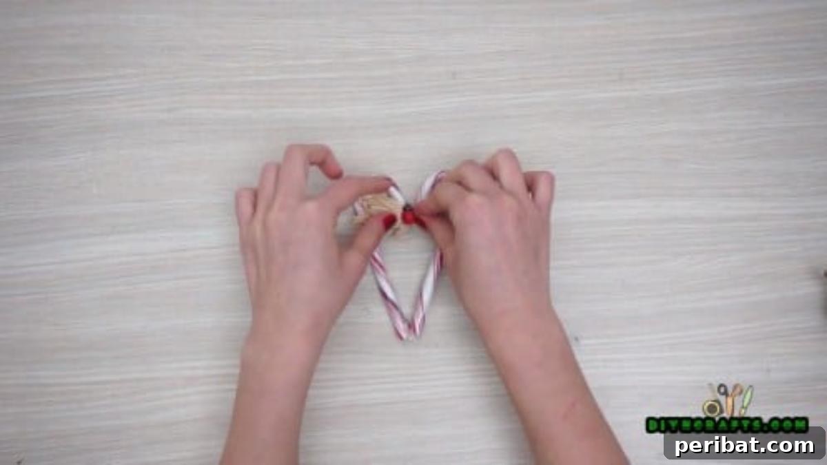 5 Festive Candy Cane Crafts to Sweeten Your Christmas 10 Candy Cane Heart Ornament - 5 Candy Cane Projects for a Deliciously Festive Christmas