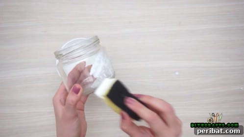 5 Frugal & Festive Christmas Jar Decorations 12 Step 1: Use a sponge to apply white paint evenly around the outside of a small glass jar.