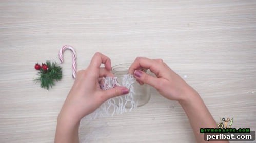 5 Frugal & Festive Christmas Jar Decorations 25 Step 1 continued: Secure the lace neatly around the jar, trimming excess.