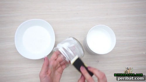 5 Frugal & Festive Christmas Jar Decorations 33 Step 2: Apply a layer of white craft glue evenly around the outside of the glass jar.