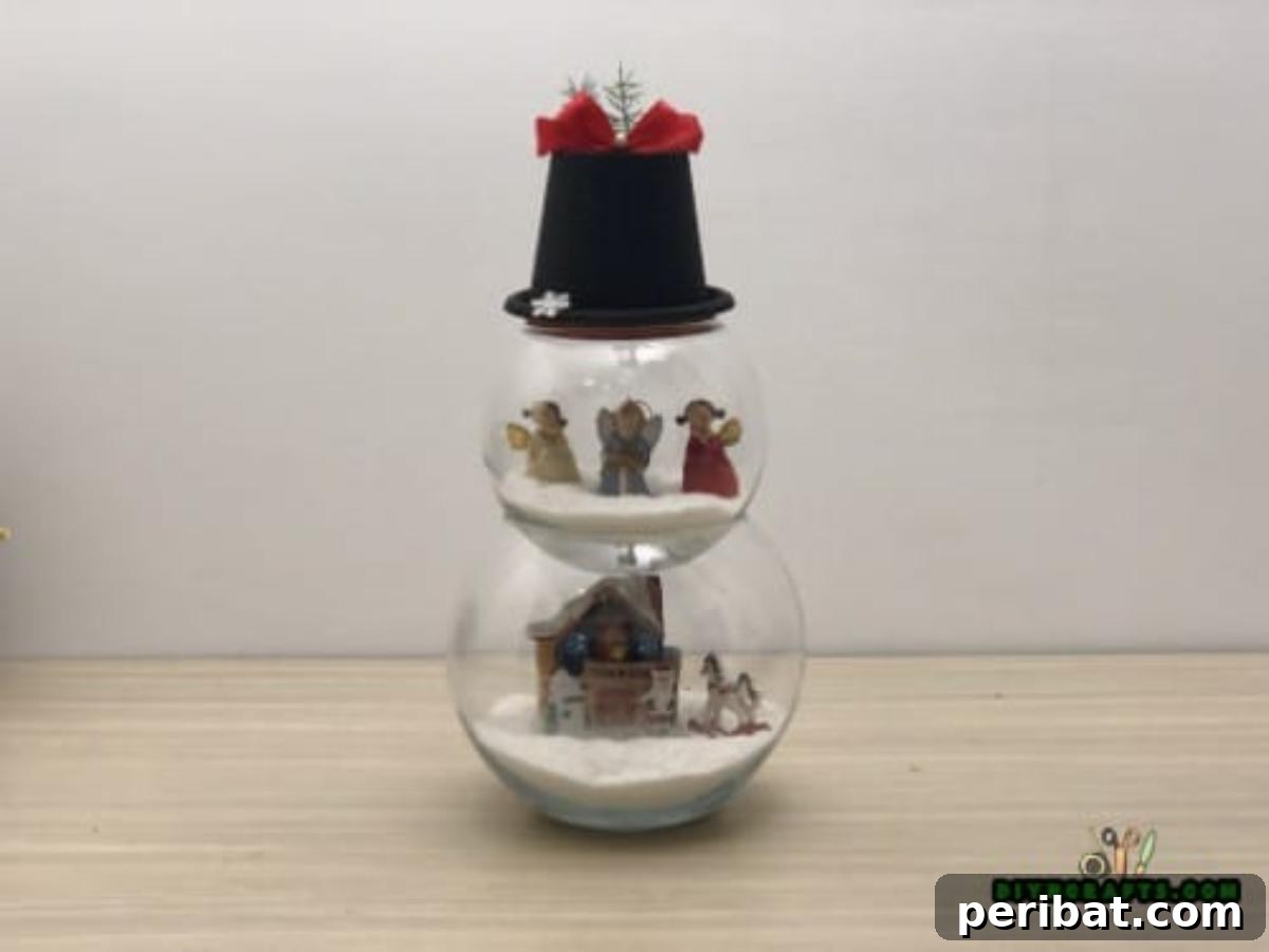 Minute-Made Snowmen: 5 Speedy & Creative Crafts 37 Front view of the elegant fishbowl snowman centerpiece, showcasing the winter scenes within
