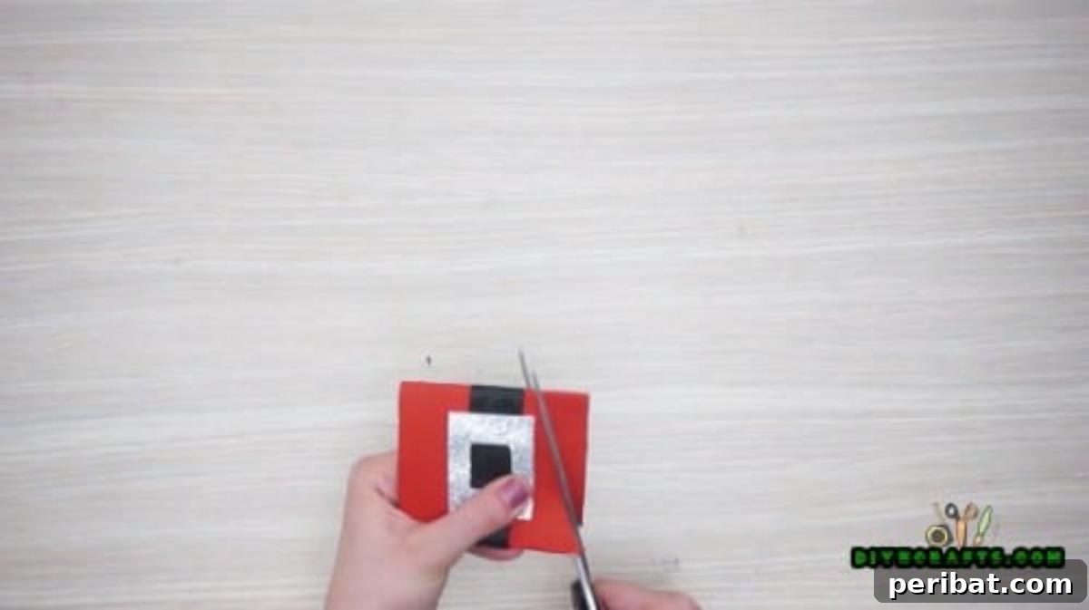 Upcycle Paper Rolls: 5 Easy Holiday Decoration Ideas 12 Napkin Ring - Step 5: Cutting an arc for napkin placement