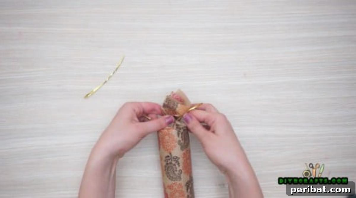 Upcycle Paper Rolls: 5 Easy Holiday Decoration Ideas 17 Christmas Cracker - Step 3: Secured end of the Christmas cracker