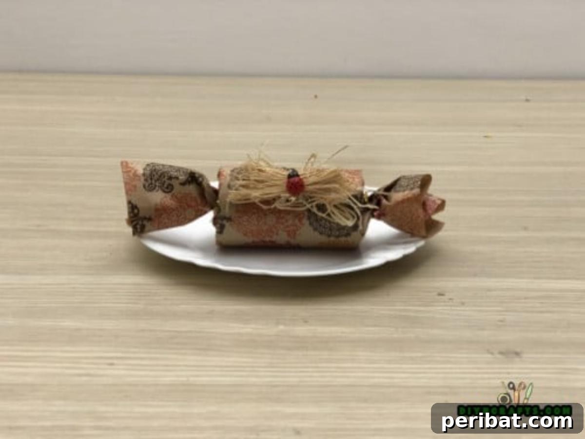 Upcycle Paper Rolls: 5 Easy Holiday Decoration Ideas 19 Christmas Cracker - Final: Fully assembled Christmas cracker with contents