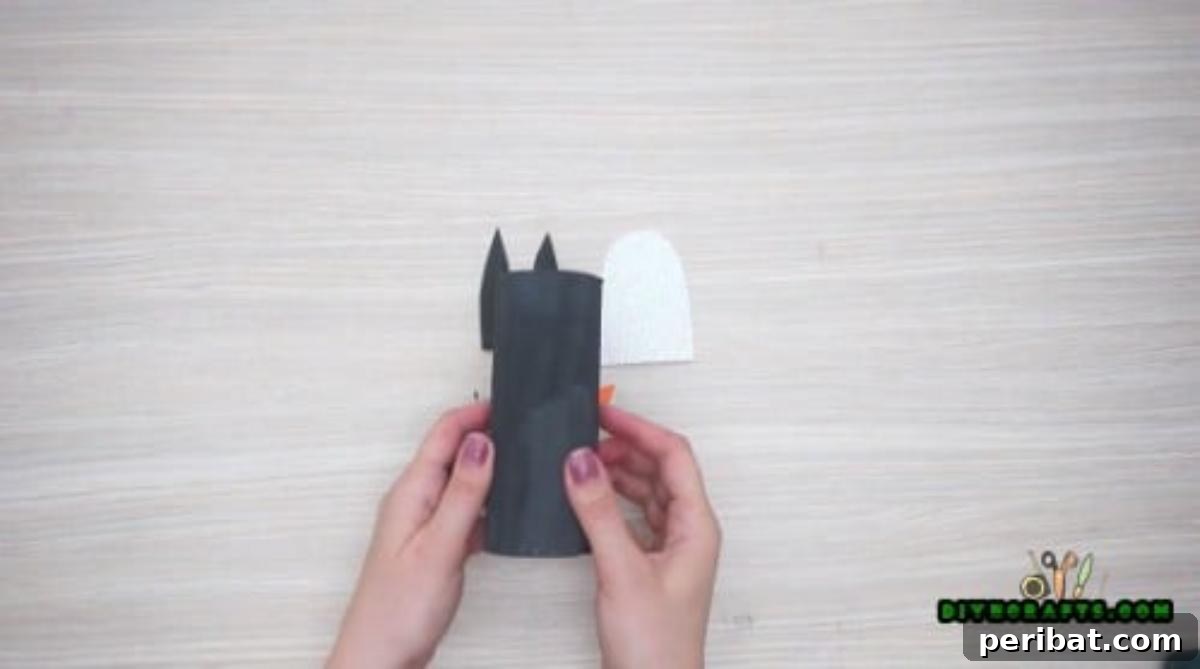 Upcycle Paper Rolls: 5 Easy Holiday Decoration Ideas 20 Cute Penguin - Step 1: Painting the paper roll black