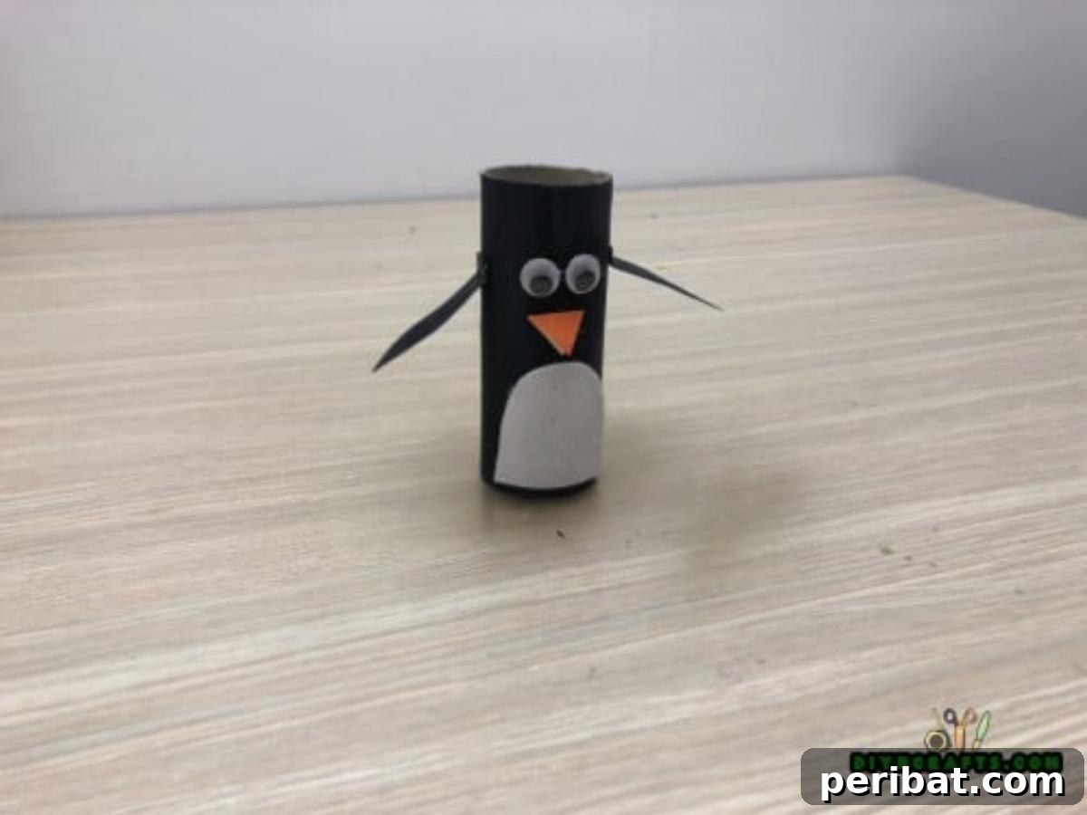 Upcycle Paper Rolls: 5 Easy Holiday Decoration Ideas 25 Cute Penguin - Final: Completed cute paper roll penguin