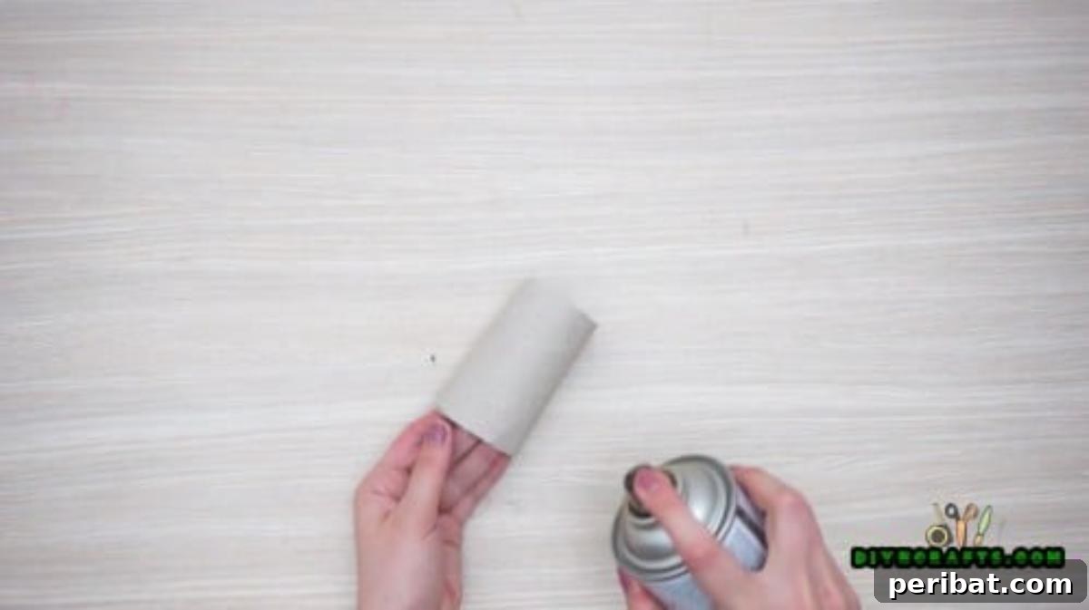 Upcycle Paper Rolls: 5 Easy Holiday Decoration Ideas 26 Flower Wreath - Step 1: Spray painting a paper roll metallic
