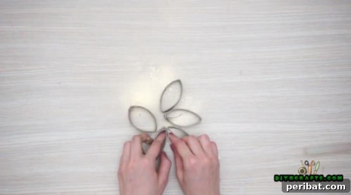 Upcycle Paper Rolls: 5 Easy Holiday Decoration Ideas 29 Flower Wreath - Step 4: Collection of metallic paper roll flowers