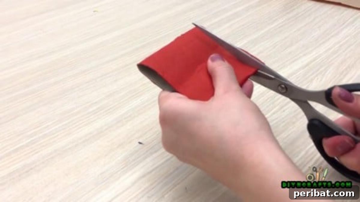 Upcycle Paper Rolls: 5 Easy Holiday Decoration Ideas 4 Christmas Poinsettia - Step 2: Flattening the paper roll