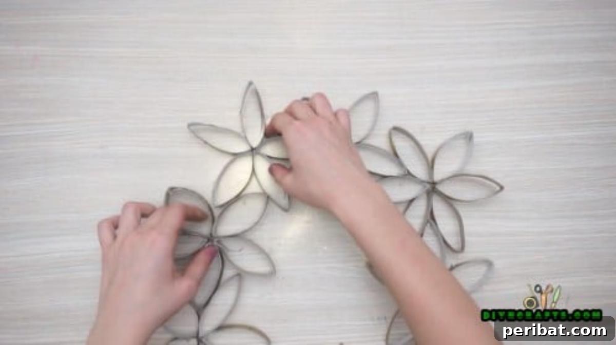 Upcycle Paper Rolls: 5 Easy Holiday Decoration Ideas 32 Flower Wreath - Final: Completed stunning metallic flower wreath