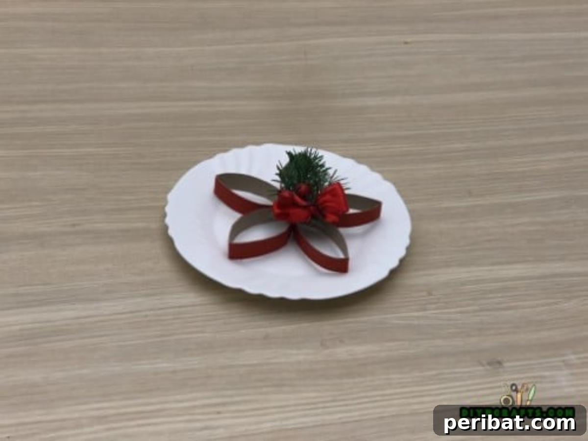 Upcycle Paper Rolls: 5 Easy Holiday Decoration Ideas 7 Christmas Poinsettia - Step 4: Finished poinsettia with embellishments