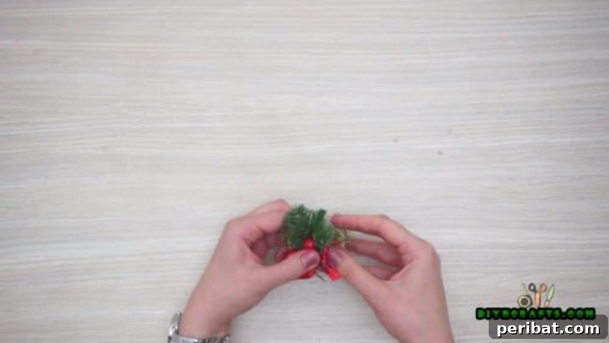 Instant Holiday Glam: 5 Napkin Rings in Less Than 2 Mins 12 Positioning Pine Sprig on Napkin Ring