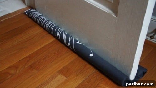 17 Ingenious DIY Draft Stoppers To Beat The Winter Chill 14 Under Door Draft Blocker