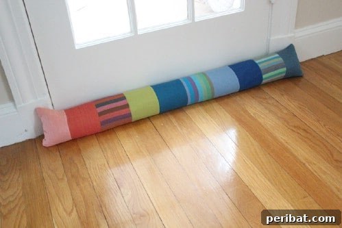 17 Ingenious DIY Draft Stoppers To Beat The Winter Chill 4 DIY Patchwork Draft Stopper