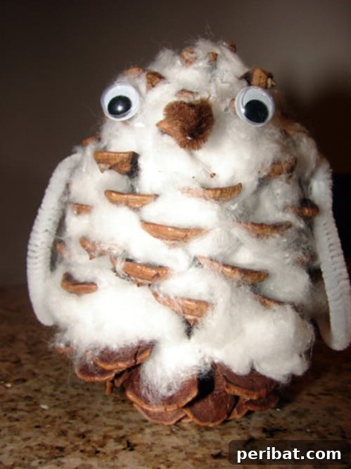 Winter Wonder Crafts: Engaging Indoor Activities for Kids 12 Snowy Owl Pinecone Craft