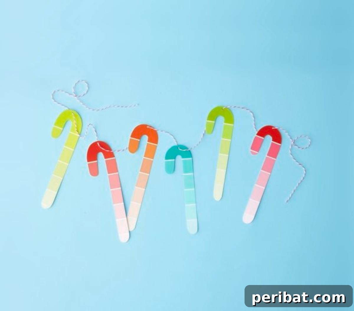 Deck Your Halls: 25 Easy DIY Garlands for Holiday Decor 16 Paper Candy Cane Garland