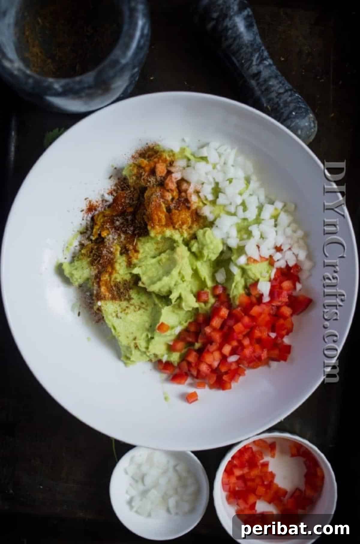 Fresh cherry tomatoes, onions and red peppers give this guacamole a wonderful flavor