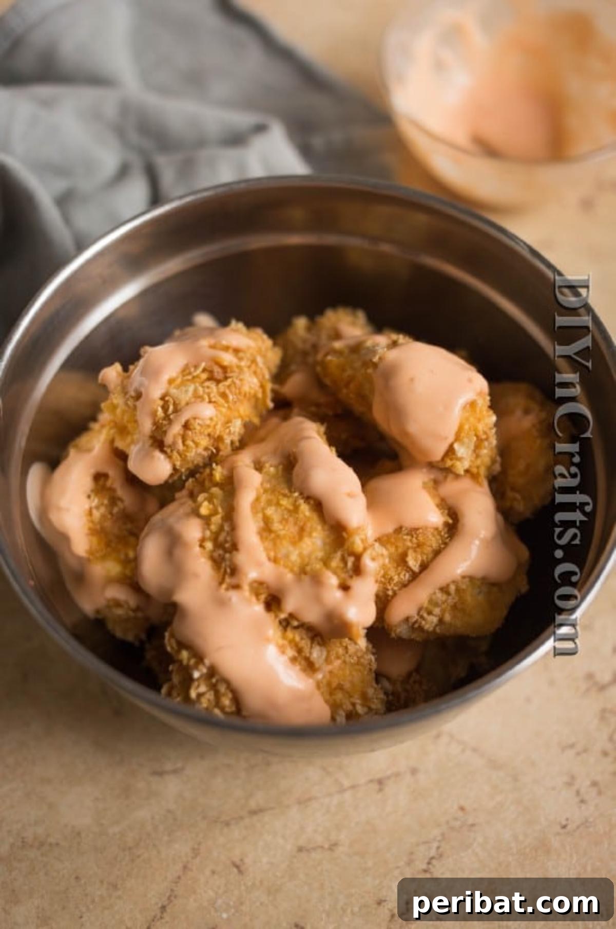 Your New Favorite Easy Bang Bang Chicken Recipe 6 Drizzle with sauce for a delicious appetizer or snack