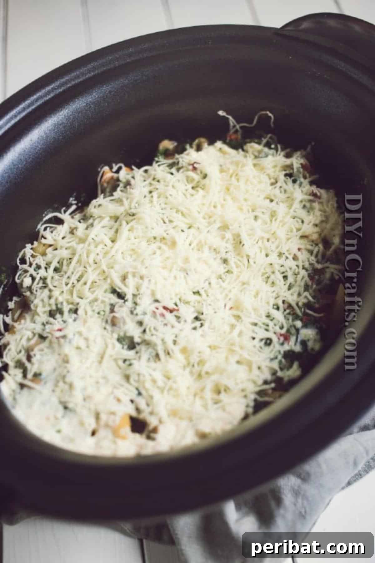 One-Pot Slow Cooker Pasta Your Ultimate Weeknight Win 5 Cover with mozzarella cheese before cooking