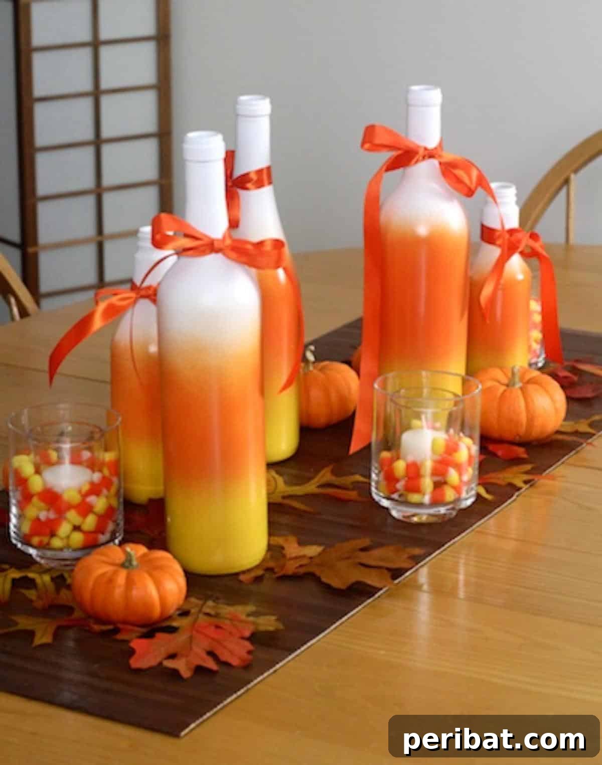 40 Spooktacularly Simple DIY Halloween Decorations 12 DIY Candy Corn Centerpiece for Halloween table