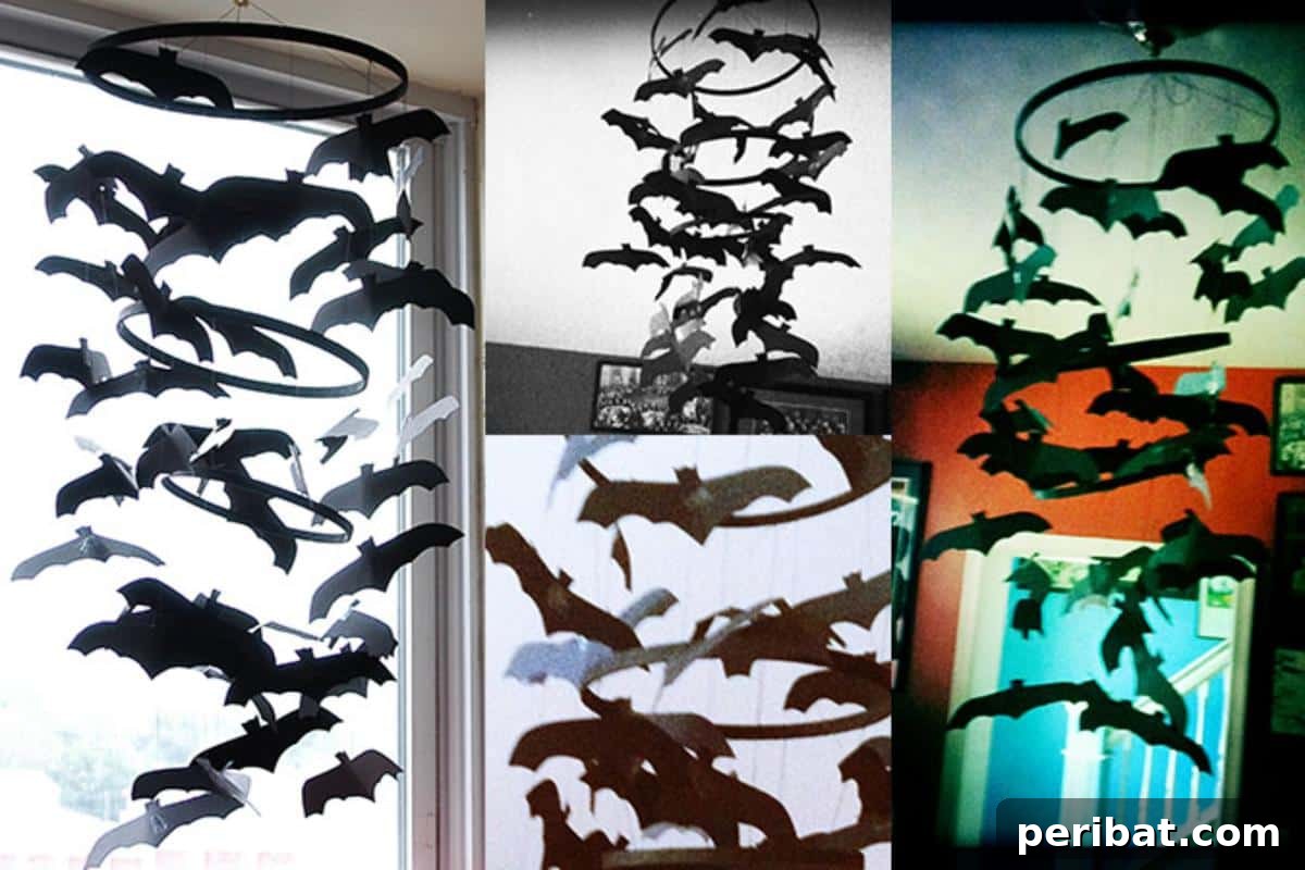 40 Spooktacularly Simple DIY Halloween Decorations 13 DIY Hanging Bat Chandelier for spooky ceiling decor